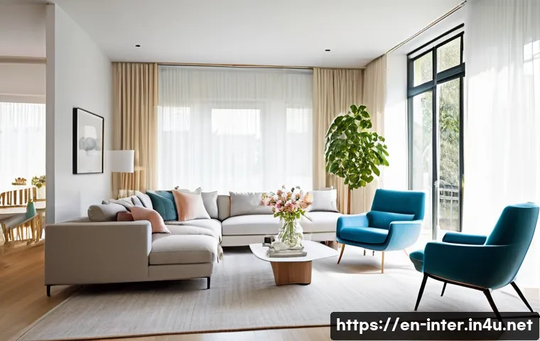 거실 가구 배치 노하우 - A modern living room with thoughtfully arranged furniture maintaining clear traffic paths of 30-36 i...